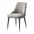 Chaise de salle à manger en similicuir gris de style contemporain, dimensions 60x52x85 cm, par Narqevix.